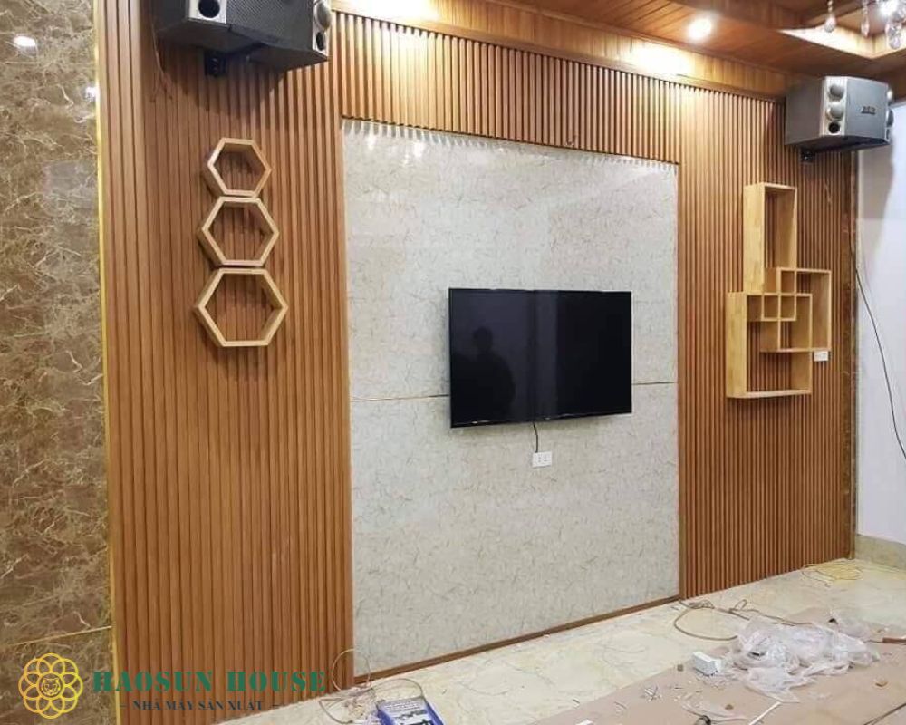 Vách ngăn ốp tường phòng khách bằng nhựa nano