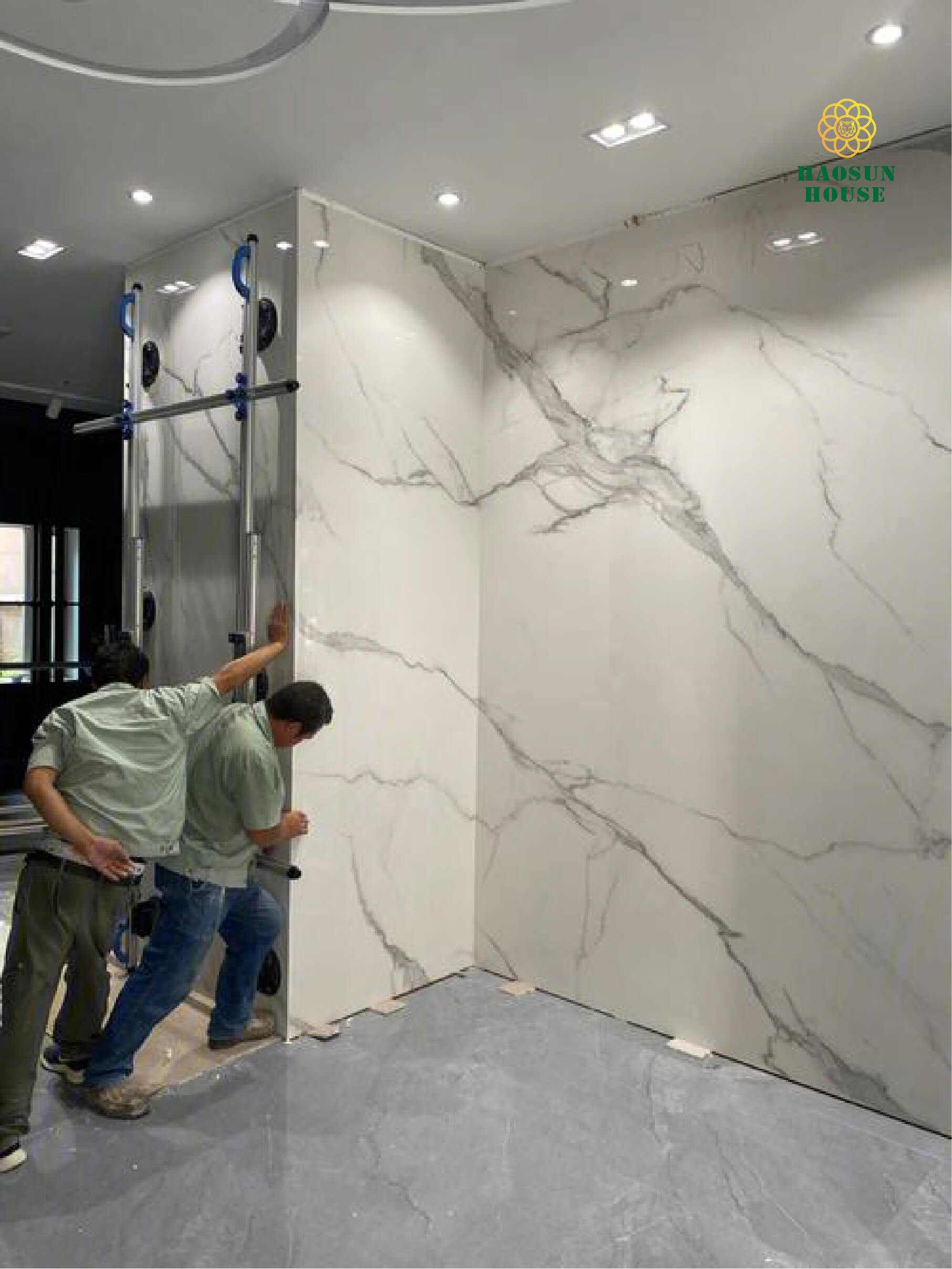 Thi công tấm pvc vân đá ốp tường phòng khách