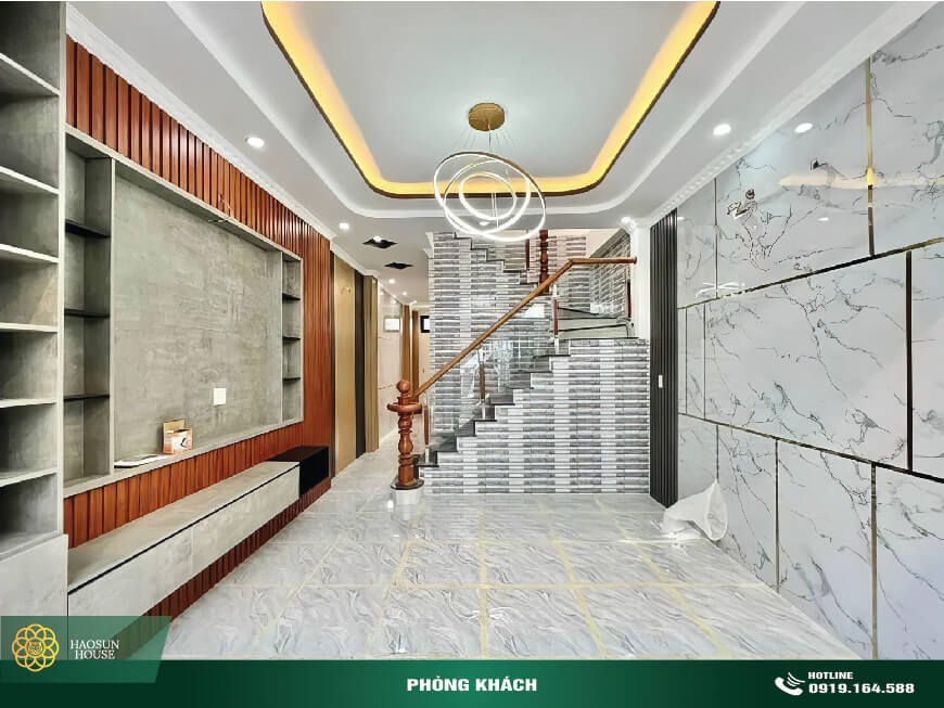 Thi công tấm nhựa pvc ốp tường vân đá phòng khách