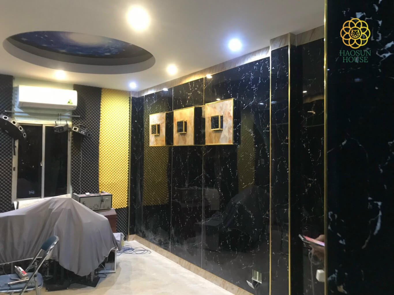 Thi công tấm pvc vân đá không gian lớn