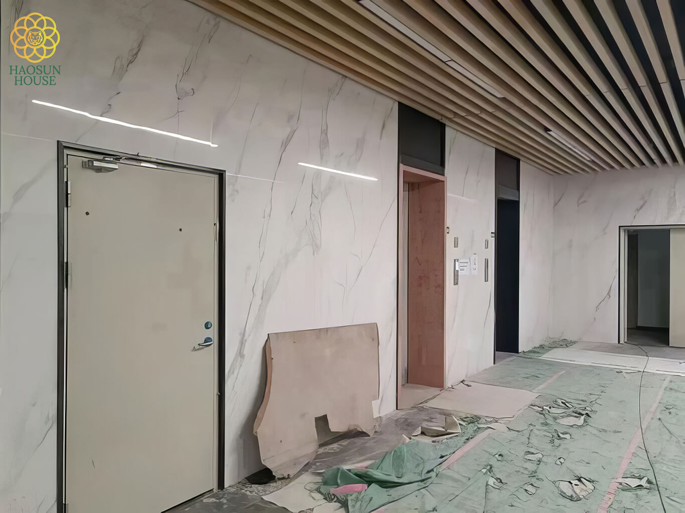 Thi công tấm pvc vân đá ốp tường